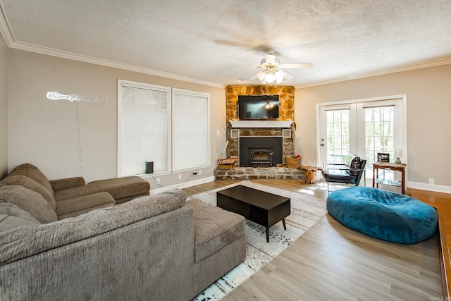 living room featuring a textured ceiling and wood-type flooring