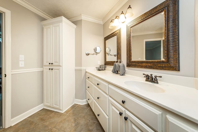 bathroom featuring vanity, tile patterned flooring, and ornamental molding