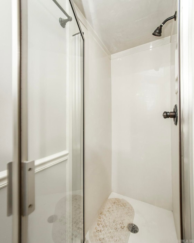 bathroom featuring an enclosed shower