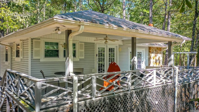 exterior space with ceiling fan and a wooden deck