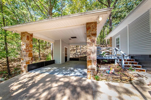 view of patio / terrace featuring a carport