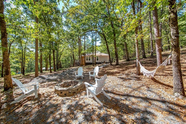 view of yard featuring a fire pit