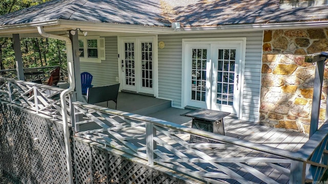 wooden deck featuring french doors