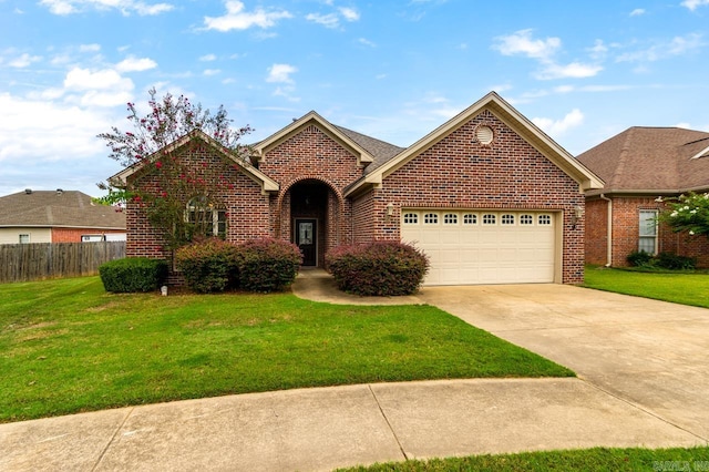 view of front facade featuring a garage and a front yard