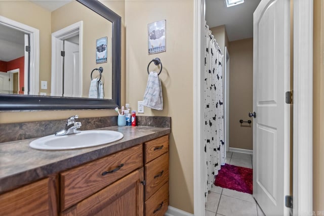 bathroom featuring tile patterned floors and vanity