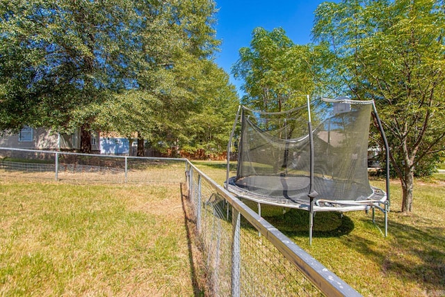 view of yard featuring a trampoline