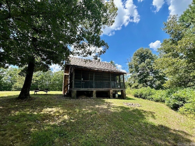 view of yard with a sunroom