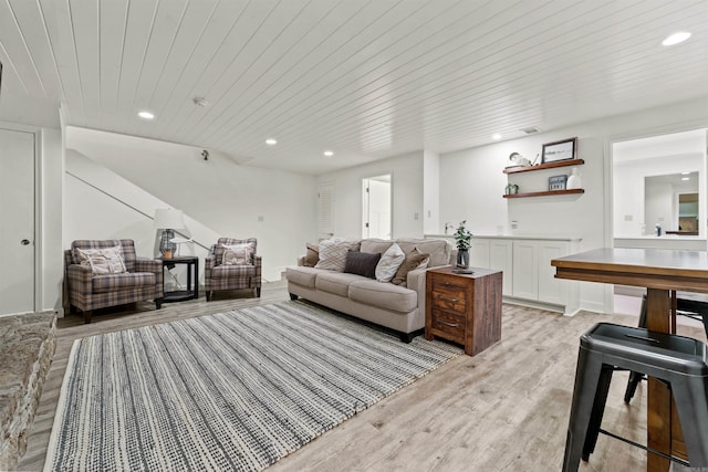 living room featuring wooden ceiling and light hardwood / wood-style floors