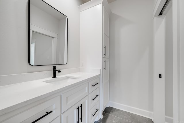 bathroom with vanity and tile patterned flooring