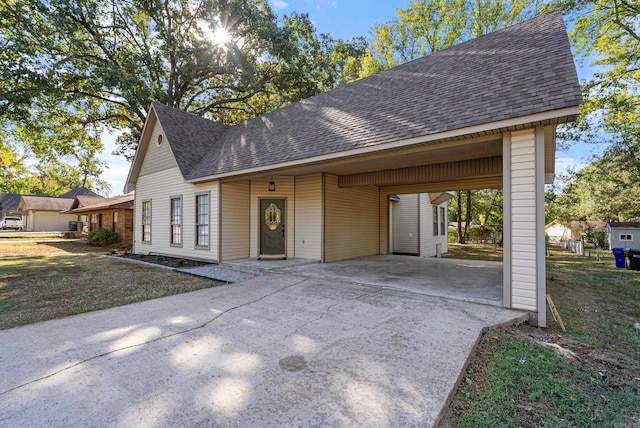 view of front of house with a carport