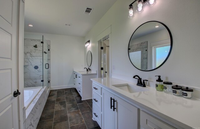 bathroom featuring tile patterned floors, independent shower and bath, and vanity