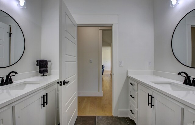 bathroom with vanity and tile patterned floors