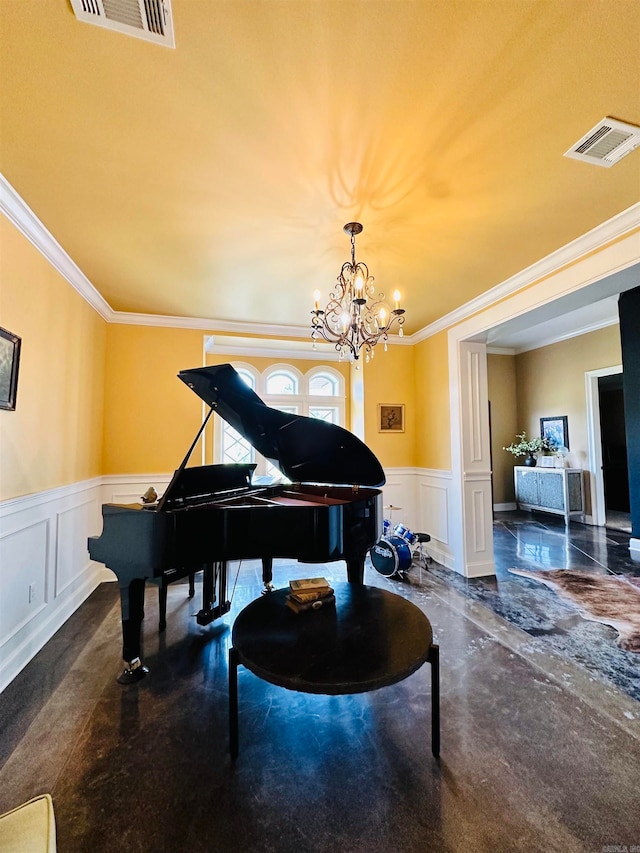 misc room with an inviting chandelier and crown molding