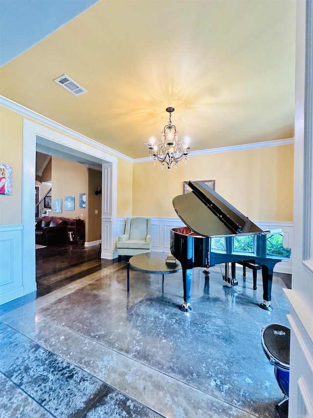 misc room with a notable chandelier and crown molding