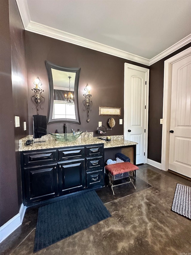 bathroom featuring ornamental molding, concrete floors, and an inviting chandelier