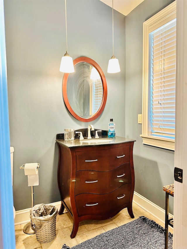 bathroom with vanity and a healthy amount of sunlight