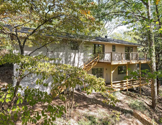 rear view of property with a deck