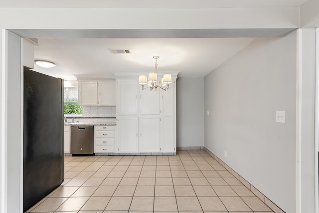 kitchen featuring decorative light fixtures, white cabinetry, dishwasher, an inviting chandelier, and black refrigerator