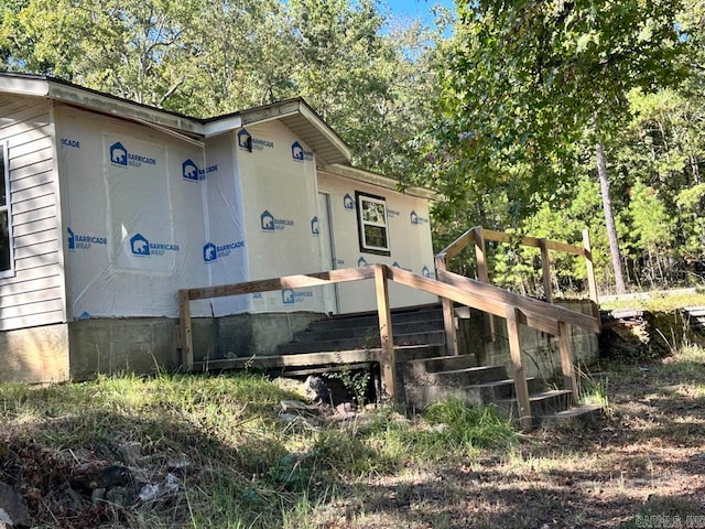 view of home's exterior with a deck