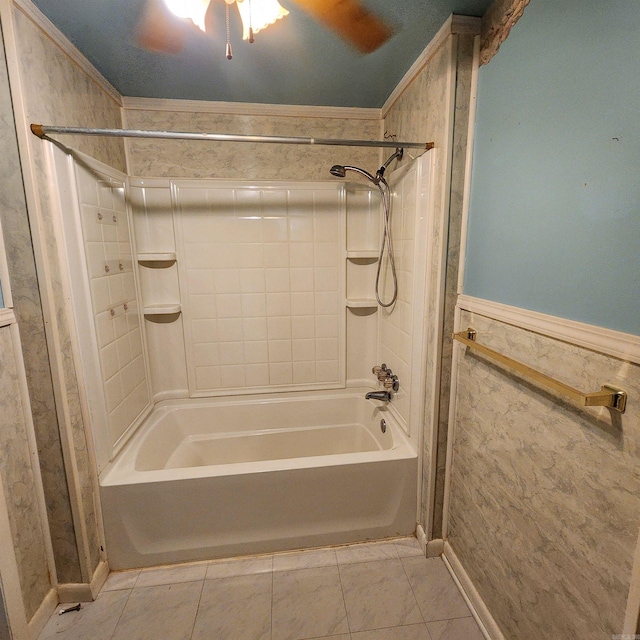 bathroom with tile walls, ornamental molding, tile patterned floors, and tiled shower / bath