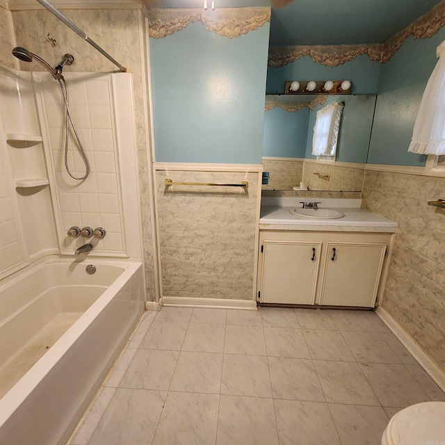 full bathroom with tile patterned flooring, bathing tub / shower combination, vanity, and toilet