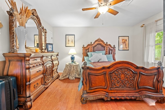 bedroom featuring wood-type flooring and ceiling fan