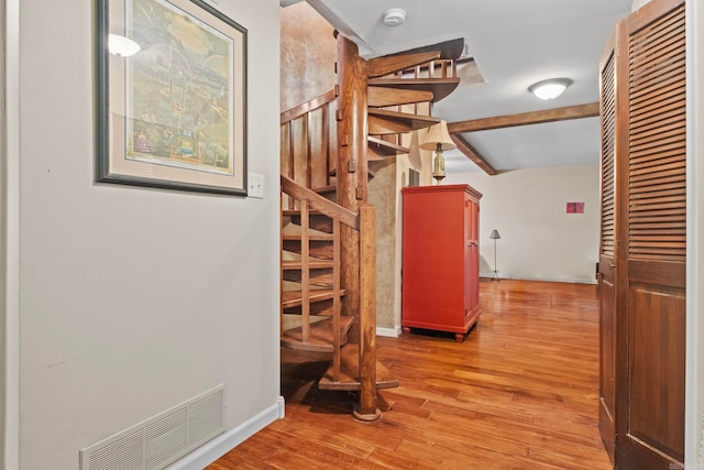 hallway featuring hardwood / wood-style floors