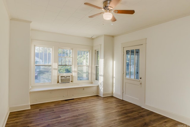 foyer entrance with cooling unit, crown molding, dark hardwood / wood-style floors, and ceiling fan