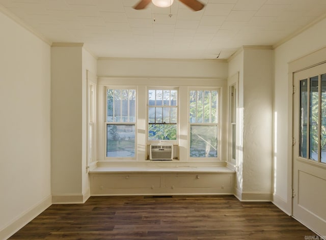 unfurnished sunroom featuring ceiling fan and cooling unit