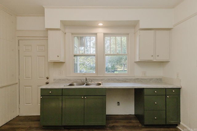 kitchen featuring white cabinets, green cabinets, sink, and dark hardwood / wood-style flooring