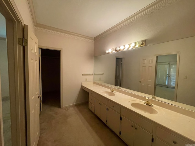 bathroom featuring ornamental molding and vanity