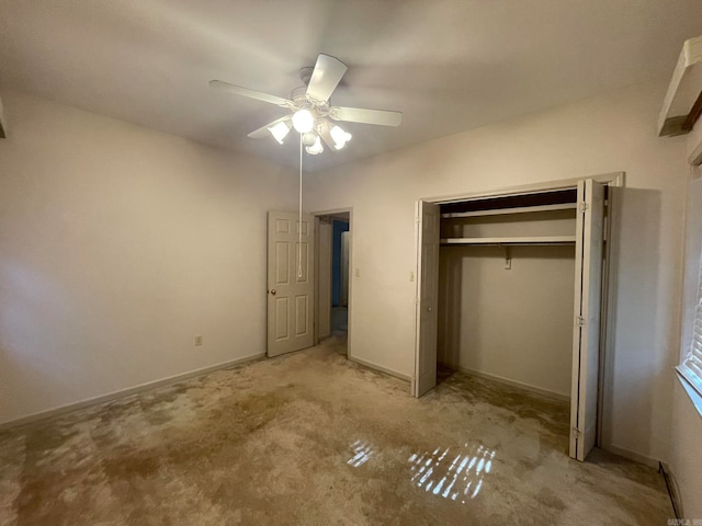 unfurnished bedroom with a closet, ceiling fan, and light colored carpet