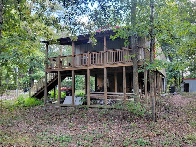 back of property with a deck