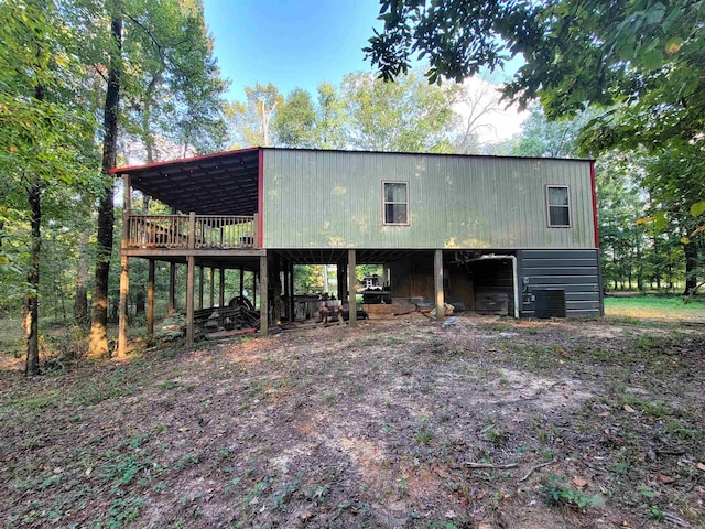 view of outbuilding featuring central air condition unit