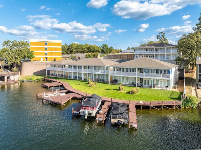 exterior space featuring a water view and a yard