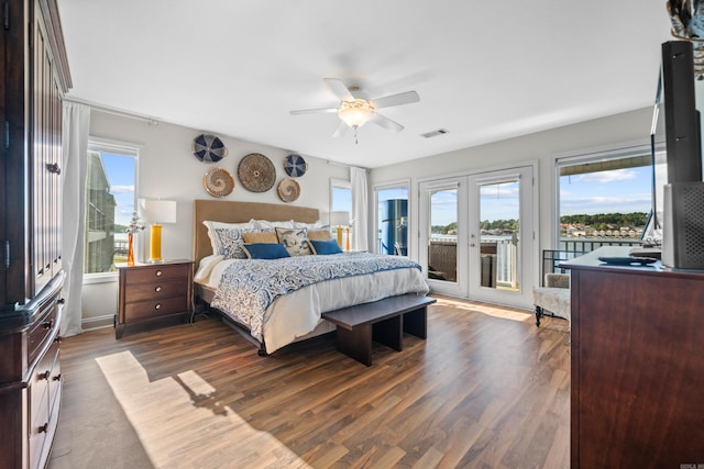 bedroom with french doors, dark hardwood / wood-style floors, access to exterior, and ceiling fan