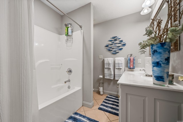 bathroom featuring shower / tub combo with curtain, tile patterned flooring, a textured ceiling, and vanity