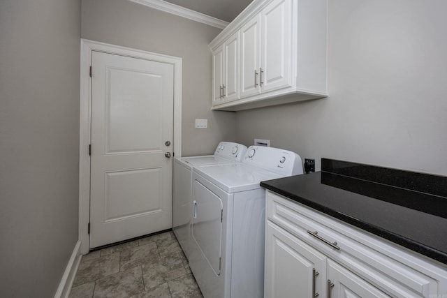 laundry area with cabinets, crown molding, and independent washer and dryer