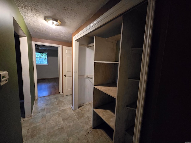 interior space with a textured ceiling