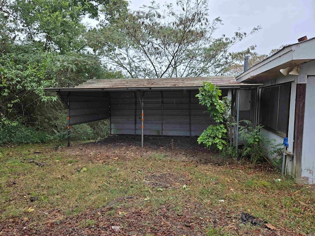 view of yard with a carport