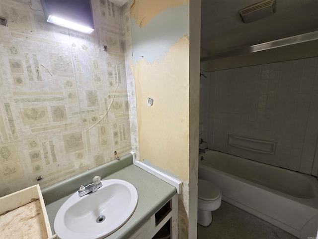 full bathroom featuring shower / tub combination, vanity, and toilet