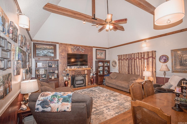 living room with ceiling fan, beamed ceiling, a textured ceiling, and hardwood / wood-style flooring