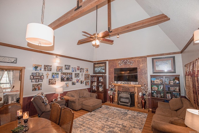 living room with high vaulted ceiling, beamed ceiling, and hardwood / wood-style flooring