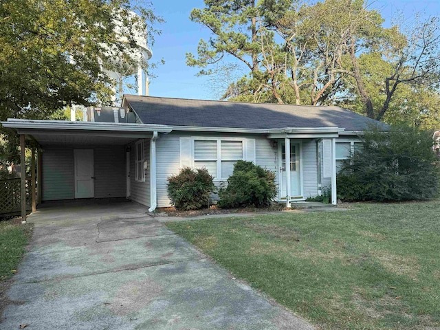 single story home with a carport and a front lawn