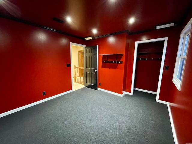 unfurnished room featuring ornamental molding