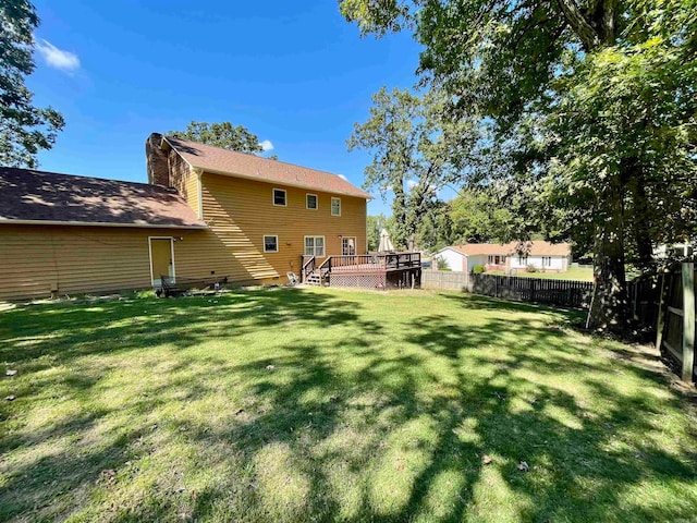 view of yard featuring a deck