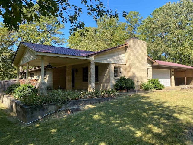 view of property exterior featuring a lawn, a garage, and ceiling fan