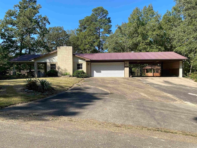 ranch-style house featuring a garage