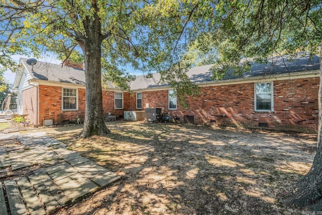 rear view of property featuring a patio area