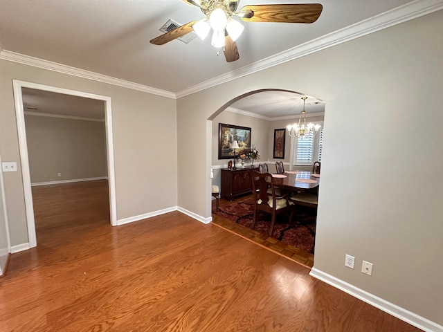 office space featuring crown molding, ceiling fan with notable chandelier, and hardwood / wood-style flooring